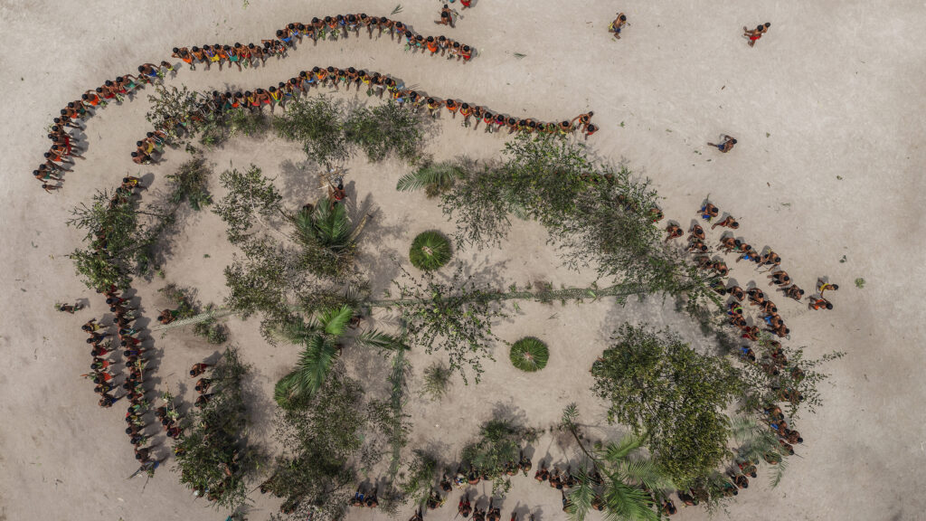 Presidente Figueiredo, Amazonas, Brazil The Kinjas perform a dance of protection around an area that symbolises their territory, in Mynawa village, on the Waimiri-Atroari Indigenous Land.
